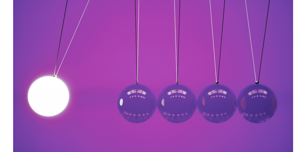 paars achtergrond met een newton's cradle